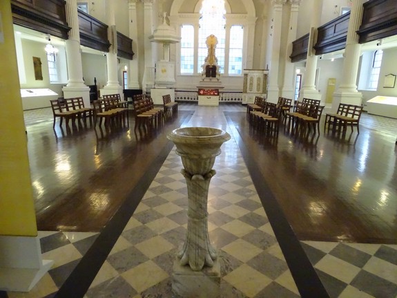 On 9/11, David Brink ran into this church and washed his eyes out using "holy water" from this basin. The sculpture on at the other end of the church contains the name of God in Hebrew.