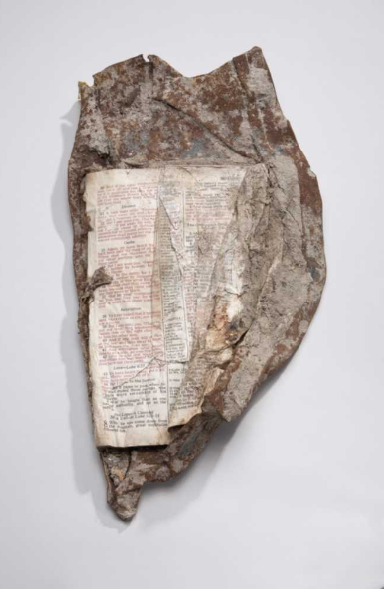 This Bible opened to the New Testament passage containing the "Sermon on the Mount" was found fused to a chunk of steel at the World Trade Center. - Photo Courtesy of 9-11 Memorial & Museum