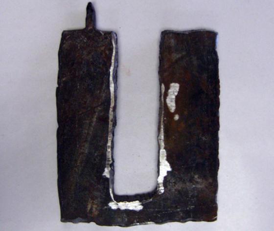 Art created by David Brink out of steel from the ruins of the towers. This piece depicts the Twin Towers. Detective Brink gave many of his art pieces to families whose loved one's remains were never recovered from Ground Zero. - Photo Courtesy of 9/11 Memorial Museum